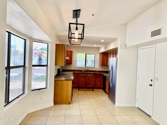 Building Photo - 8884 E Aster Dr