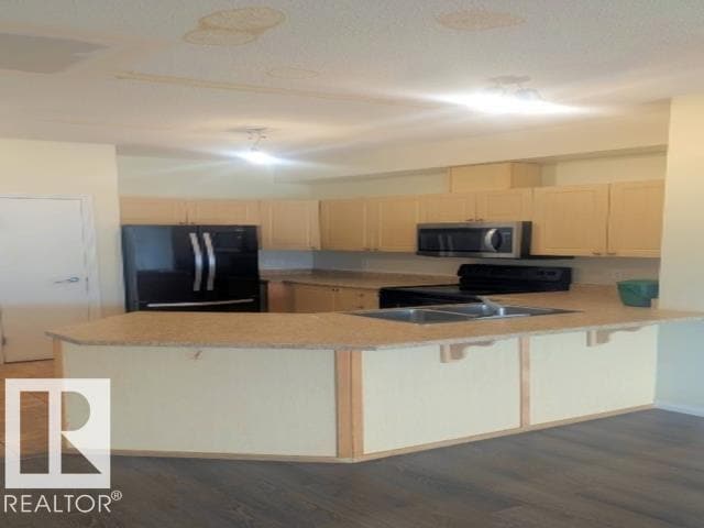 Photo du bâtiment - 4304 139 Ave NW