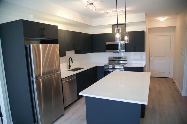 Building Photo - Stunning 3-Bedroom Condo in the Heart of Legacy Village!(IP013)