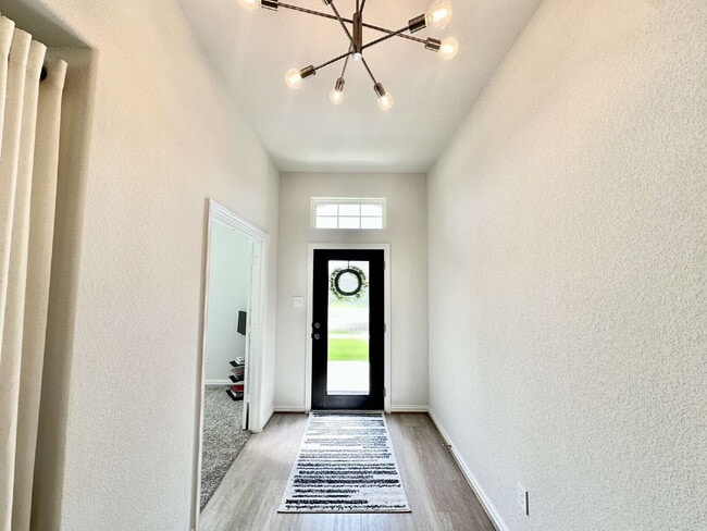 Photo - Charming 4-Bedroom Retreat with Granite Accents & Hardwood Elegance in Alvin! Apartment