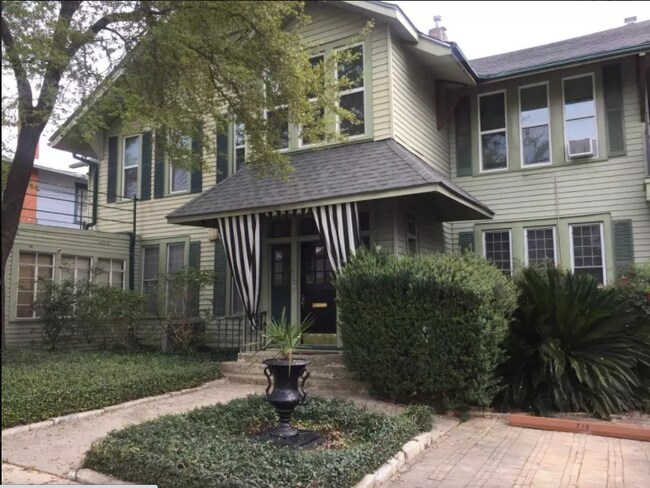 Top right apartment with sunroom and balcony. - 708 E Grayson St