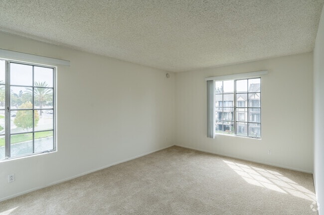 3BR, 2BA - Deauville - 1,300SF - Bedroom - Versailles on the Lake Apartments