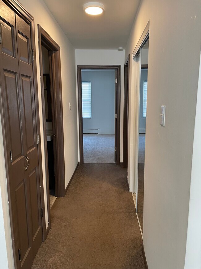 Hallway - 2 closets and a linen closet - 9429 S 86th Ct