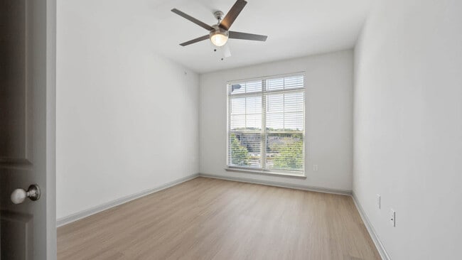Bedroom with Hard Surface Flooring - The View at Woodstock