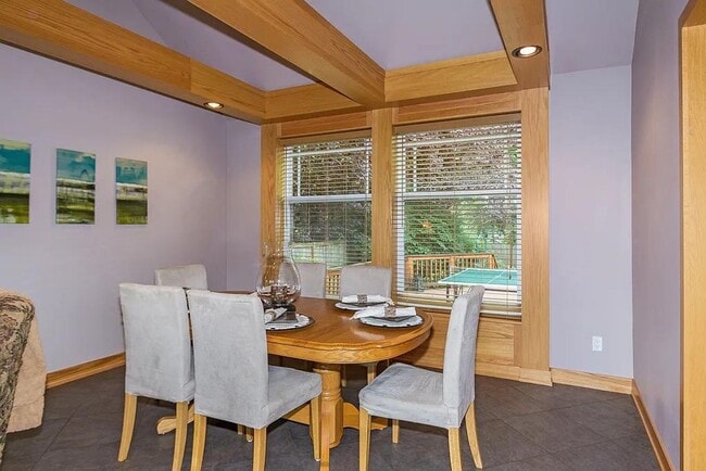 Photo - Spacious 5-Bedroom Home with Fenced Yard a...