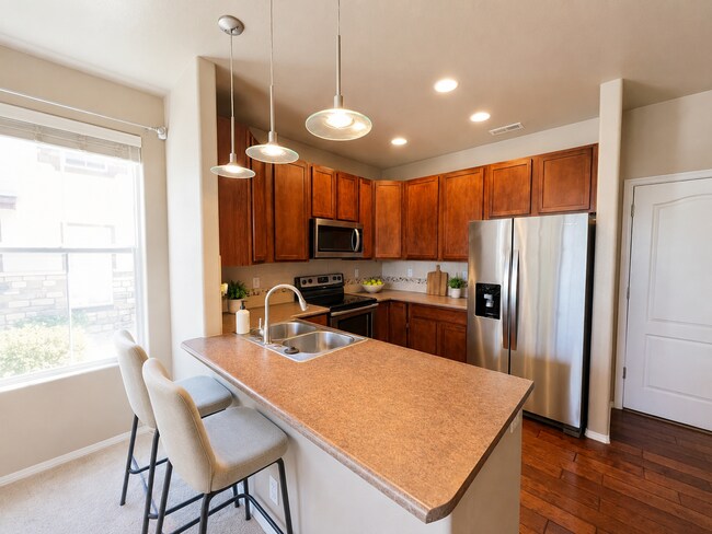 Building Photo - Stunning End Unit 3 Bedroom Townhouse in NE Colorado Springs!