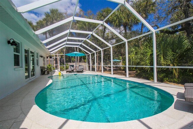 Building Photo - 5125 Sandy Beach Ave