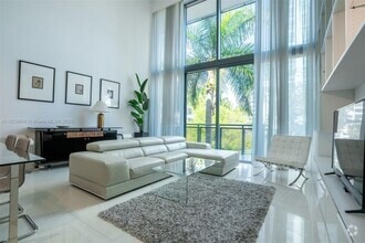 Building Photo - 6000 Collins Ave