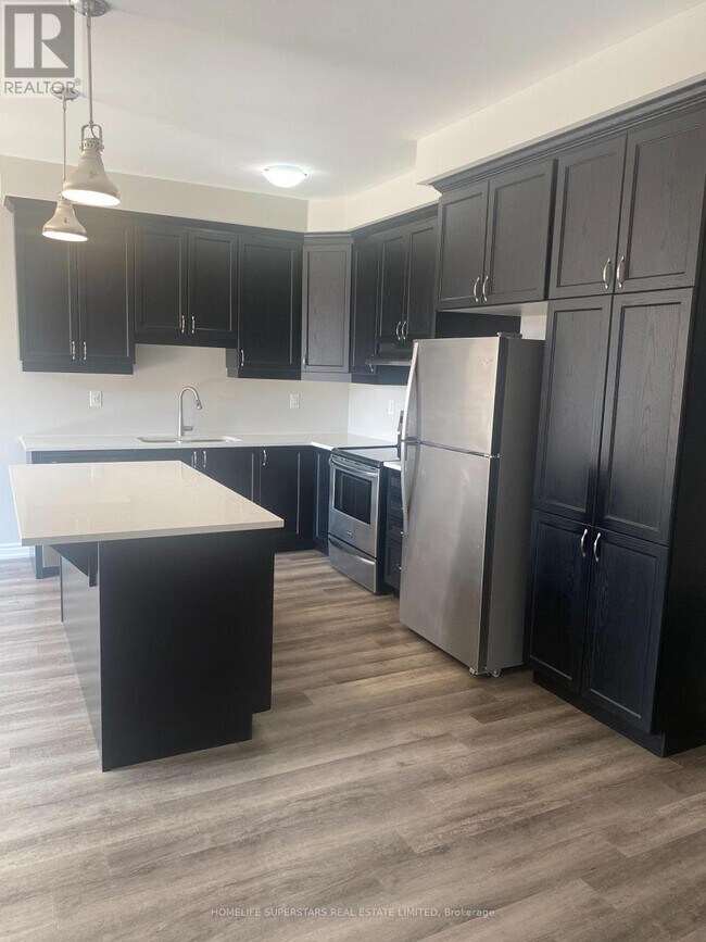 Photo du bâtiment - 975-975 Whitlock Ave