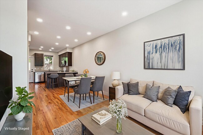 Building Photo - Modern 4-Bedroom Townhome with Rooftop Deck Near Sloan’s Lake & Light Rail