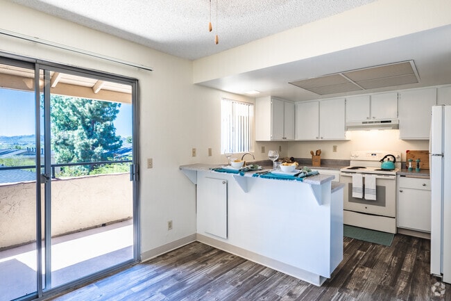 Kitchen and Balcony - Arbors Apartments