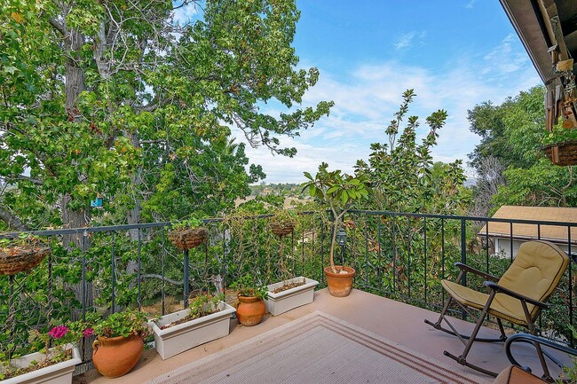 Building Photo - Welcome to this beautiful 4-bedroom, 3-bat...