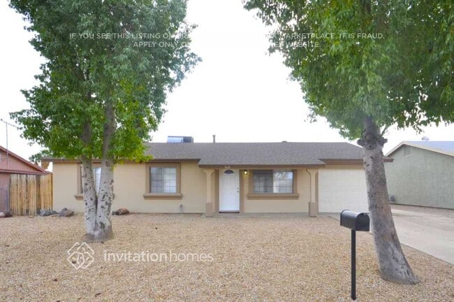 Building Photo - 3643 E Surrey Ave