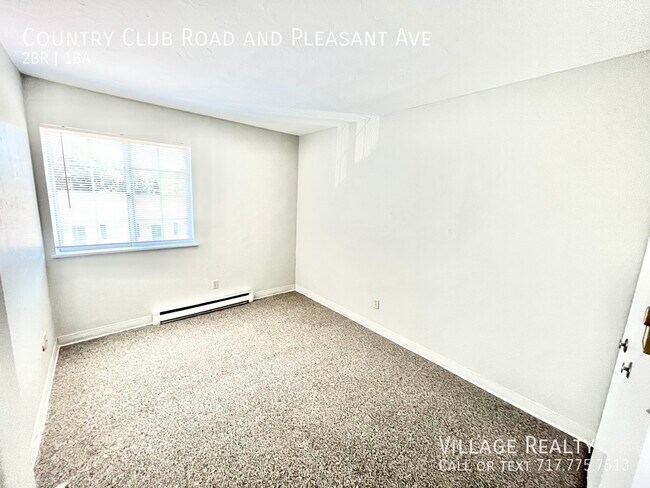 Building Photo - Roomy 2-bed w/ on-site laundry & playgroun...