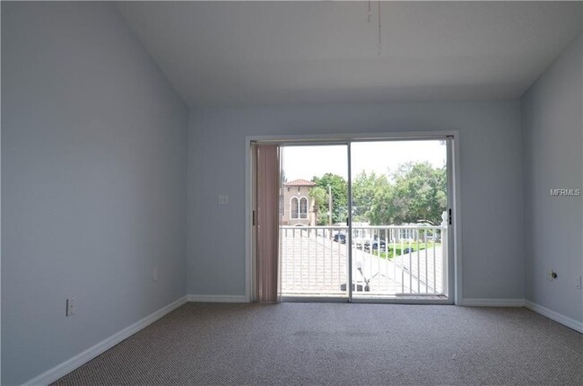 Building Photo - 4210 W Gray Street Unit 1