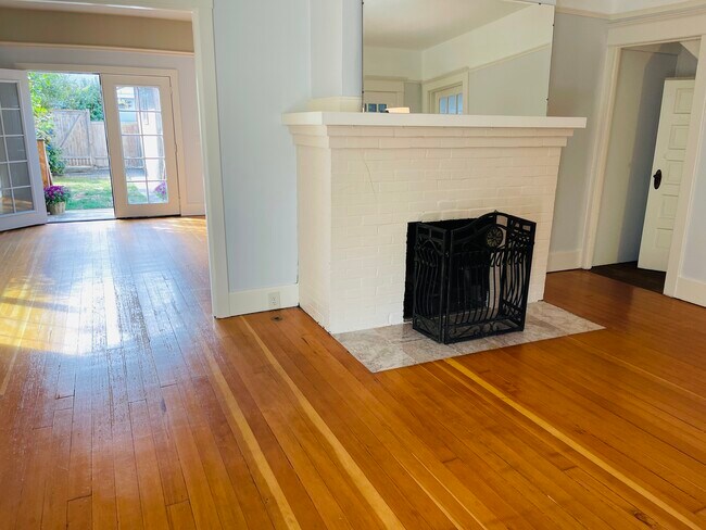 Living room with wood-burning fire place - 2005 23rd Ave W