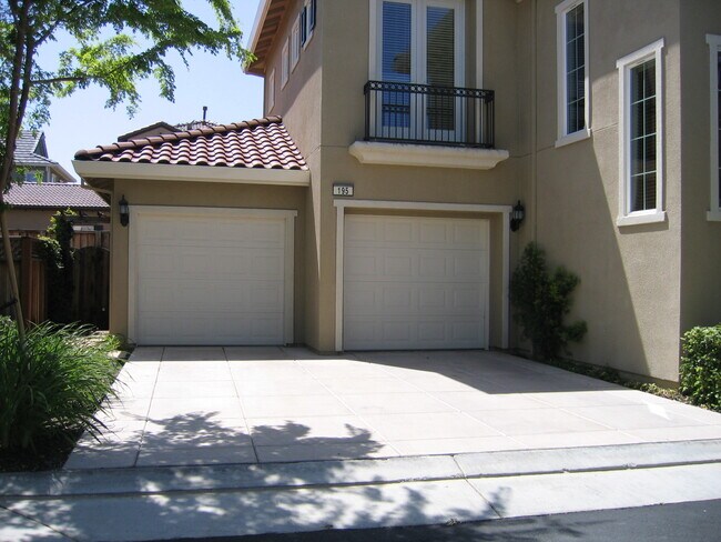 Side view with 2 garage doors - 195 S Tranquilidad St