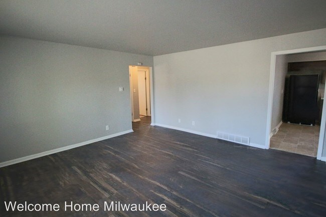 Building Photo - 8233-8235 W Villard Ave