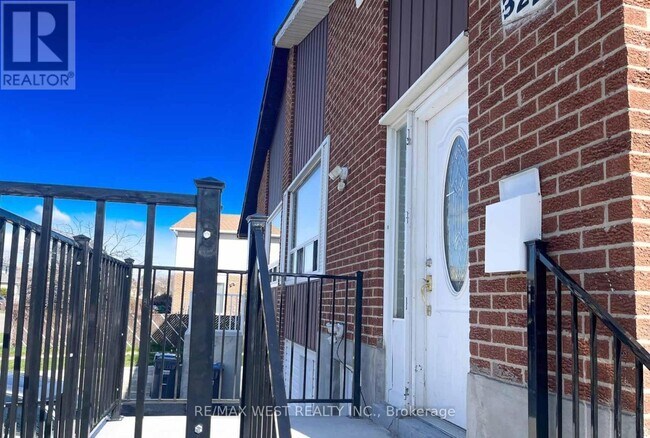 Photo du bâtiment - 322 Hansen Rd N