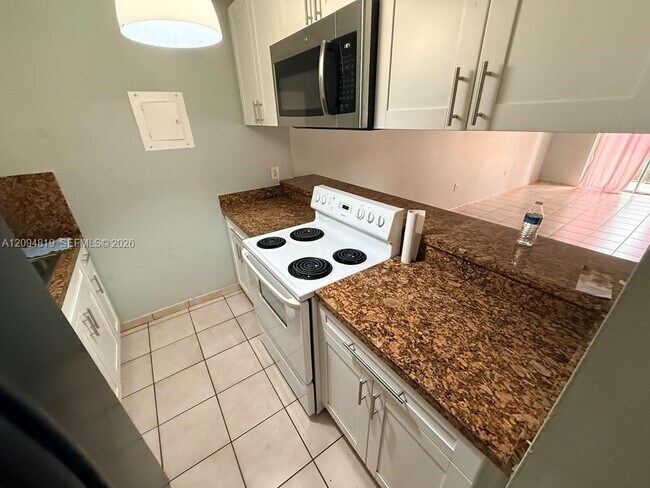 Building Photo - 1285 W 26th Pl