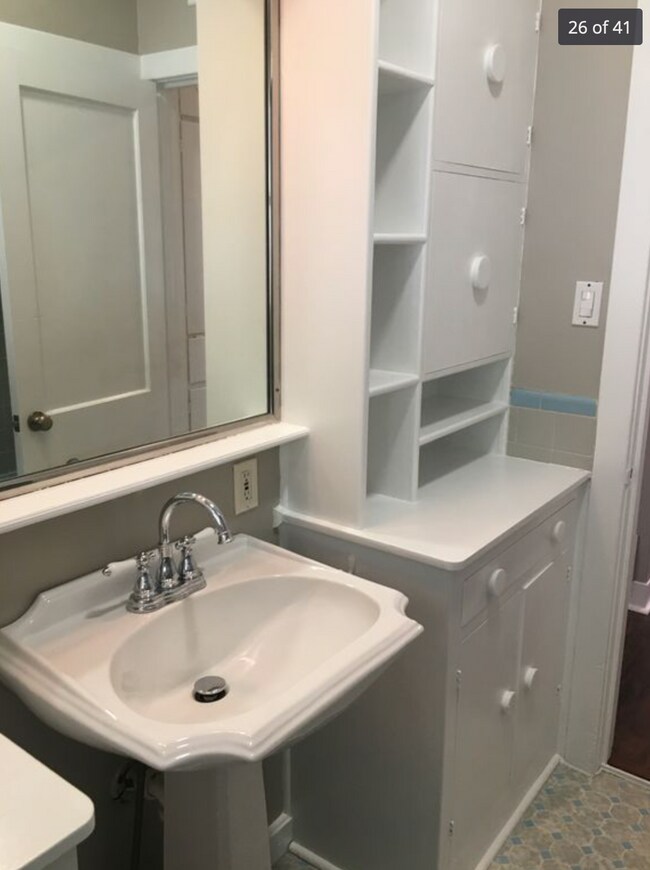 Bathroom with built-in shelves on BOTH sides of the sink- lots of storage! - 214 S Bishop St