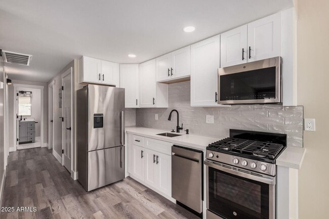 Photo - 3331 N 66th Pl Apartment