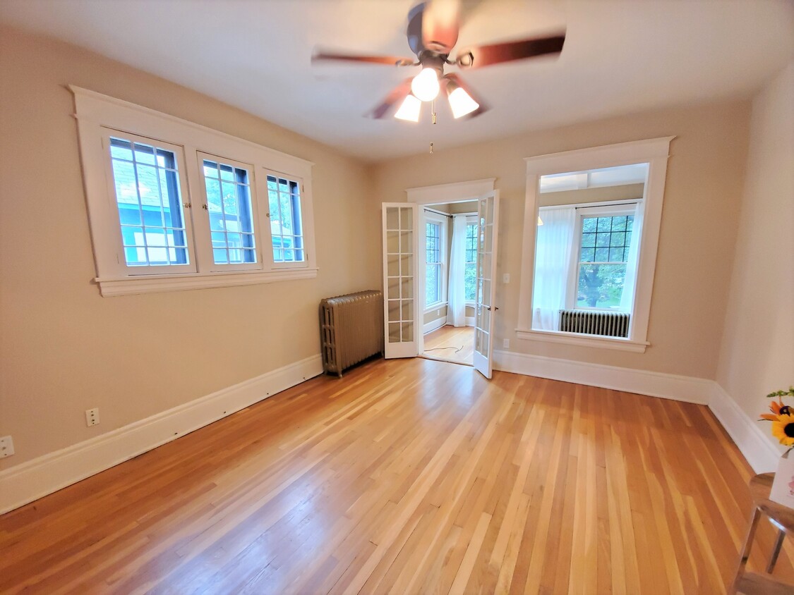 Unit 7 - Living Room and Sunroom - Grand Victoria Flats