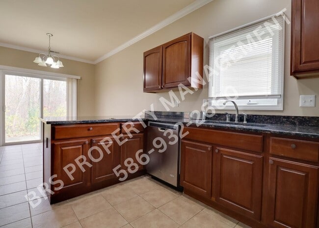 Building Photo - Ground Floor 2 BR, 2 BA condo with attached garage