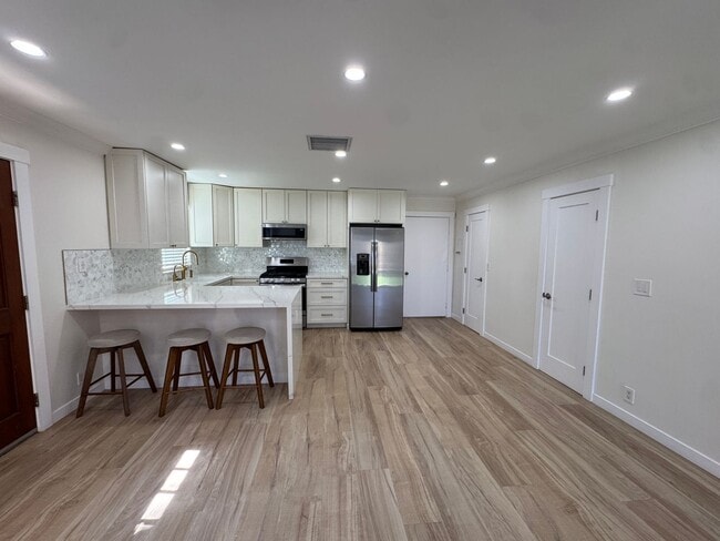 Building Photo - Renovated House for Rent