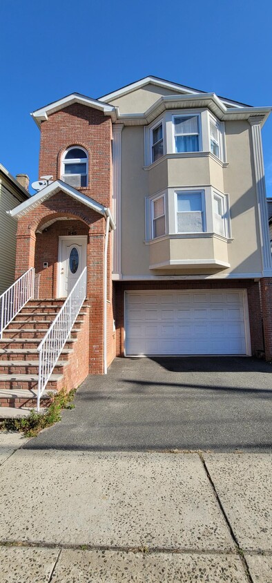 Front building with garage - 545 Livingston St