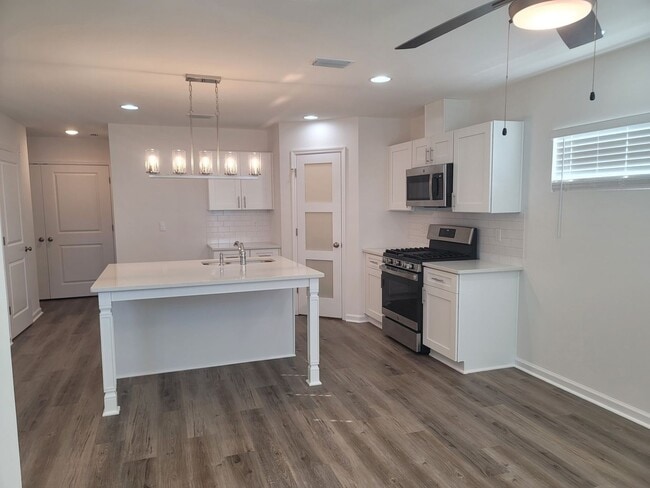 Building Photo - NEWER CONSTRUCTION! Modern NE 3/2.5 w/ Stainless Steel Appliances, Granite Counters, Washer, Drye...