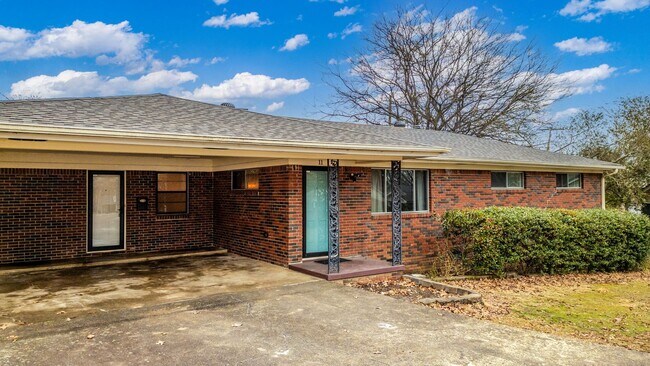 Building Photo - Updated 3BR/2BA Brick Home with Hardwood Floors & Large Yard