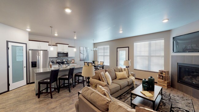 Cocina y sala de estar - Cascades Townhomes