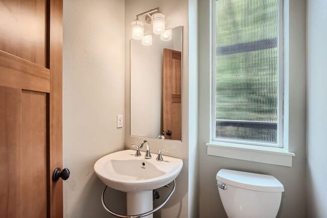 Photo - Charming three-level Townhome available for immediate move in.