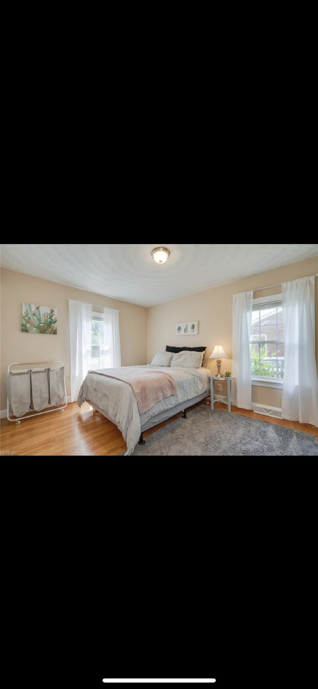 Photo - "Charming 4-Bedroom Portsmouth Retreat with Fireplace & Gleaming Hardwood Floors-Room Rental Offe... Apartment