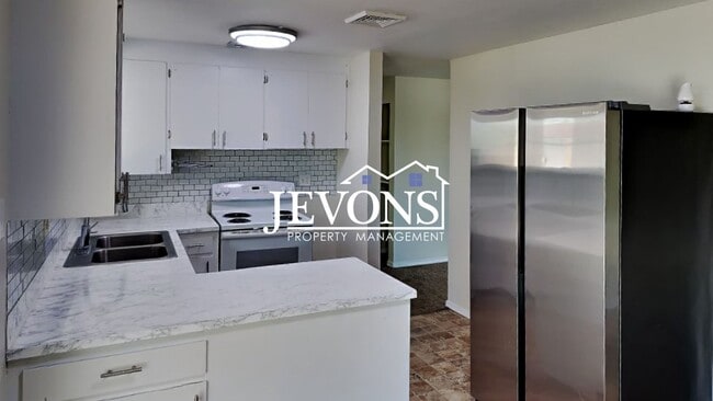 Building Photo - $500 Rent Credit | Spacious 4-bedroom home...