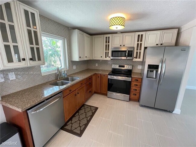 Foto del edificio - 3 br, 2 bath House - 1463 NE 28th Ct # 0 1