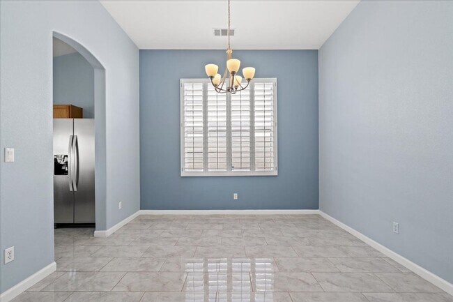 Building Photo - Multiple Living Areas 4-Bedroom Retreat with Vaulted Ceilings & No Carpet
