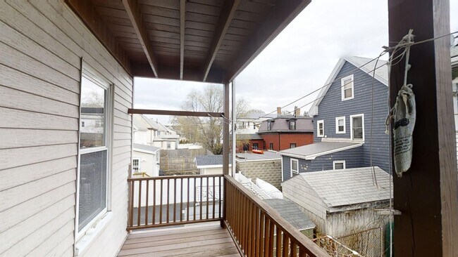 Building Photo - 9/1 No Fee! Renovated 3BR near Green Line w/balcony, free laundry