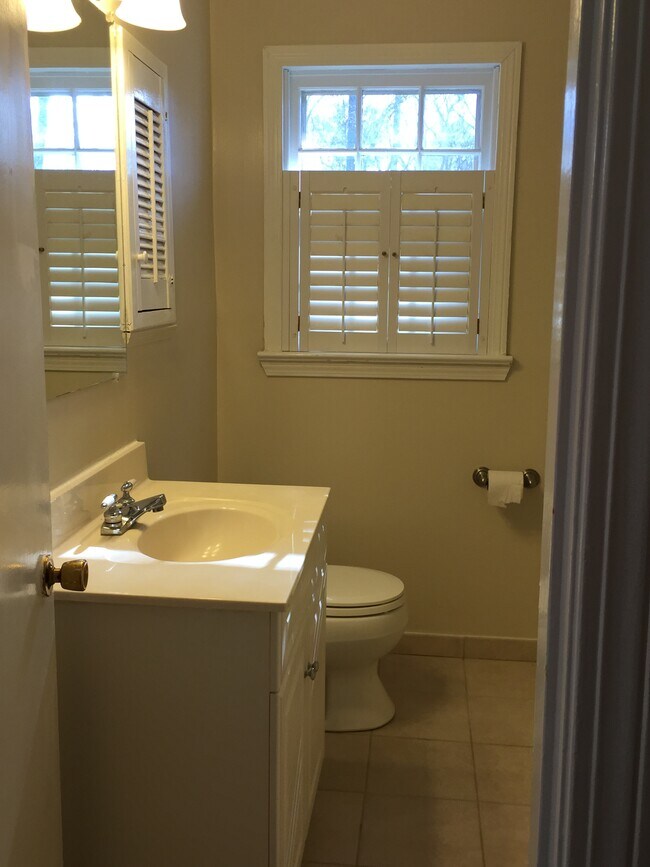main bath, redone four years ago. Large linen closet. - 217 32nd Pl E
