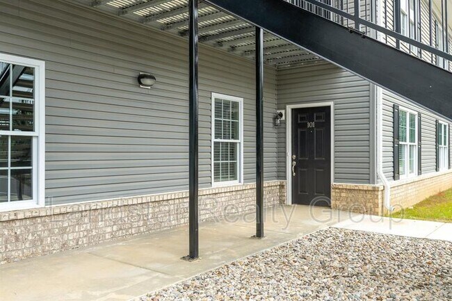 Building Photo - 7302 Tiger Way 102