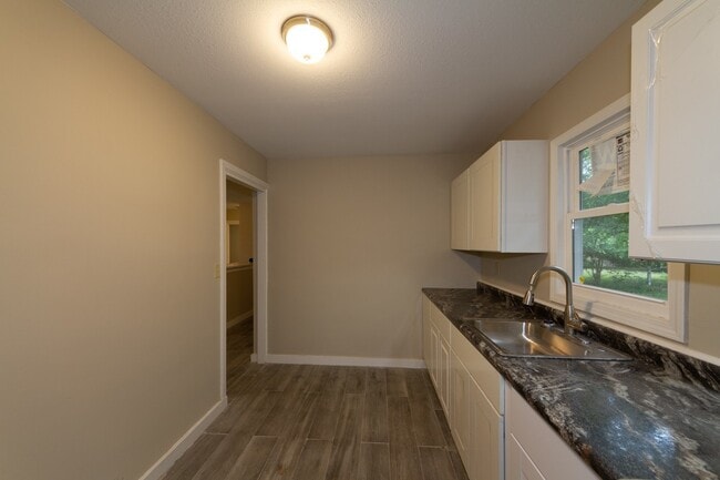 Photo - Completely remodeled 3 bed 1 bath home ready for a new tenant. Apply today and get approved for a...