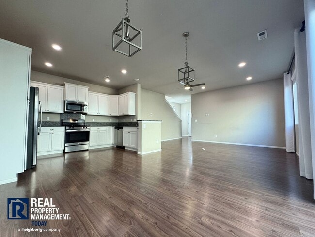 Building Photo - Spacious 4-Bedroom Home with Fenced Yard & 2-Car Garage Near JBLM!