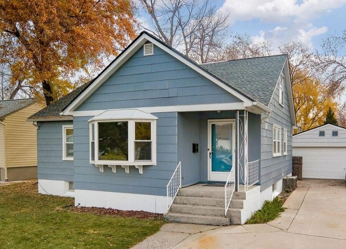 Primary Photo - 6 Bedroom Home with Garage and Fenced Yard
