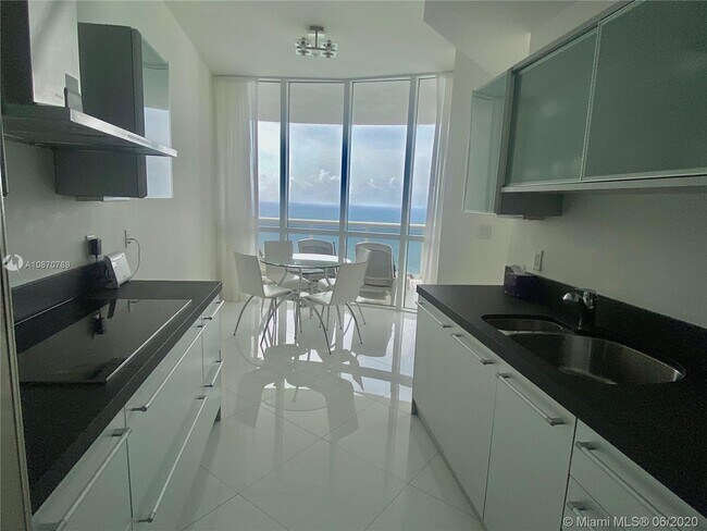 Building Photo - 18201 Collins Ave