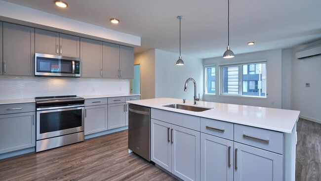 Kitchen with Stainless Steel Appliances - Zephyr on the Park