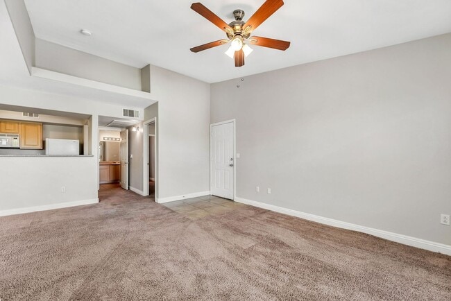 Building Photo - Top-Floor End Unit with Dual Primary Suites in a Gated Southwest Community!