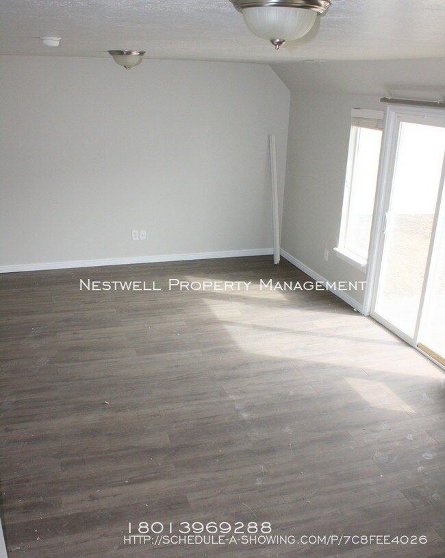 Foto del edificio - West Jordan Multi-level 6 Bed Home