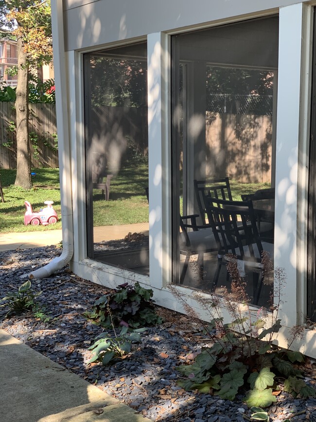 Screened porch and fenced in backyard - 1003 Dew St