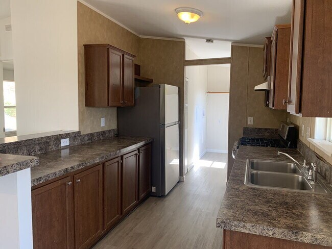 Building Photo - Enjoy country living with views in this 3-bedroom, 2-bath home.